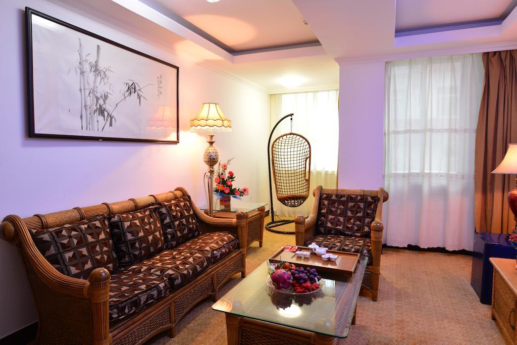 Baodao Exhibition Center Hotel Уйишань Номер фото