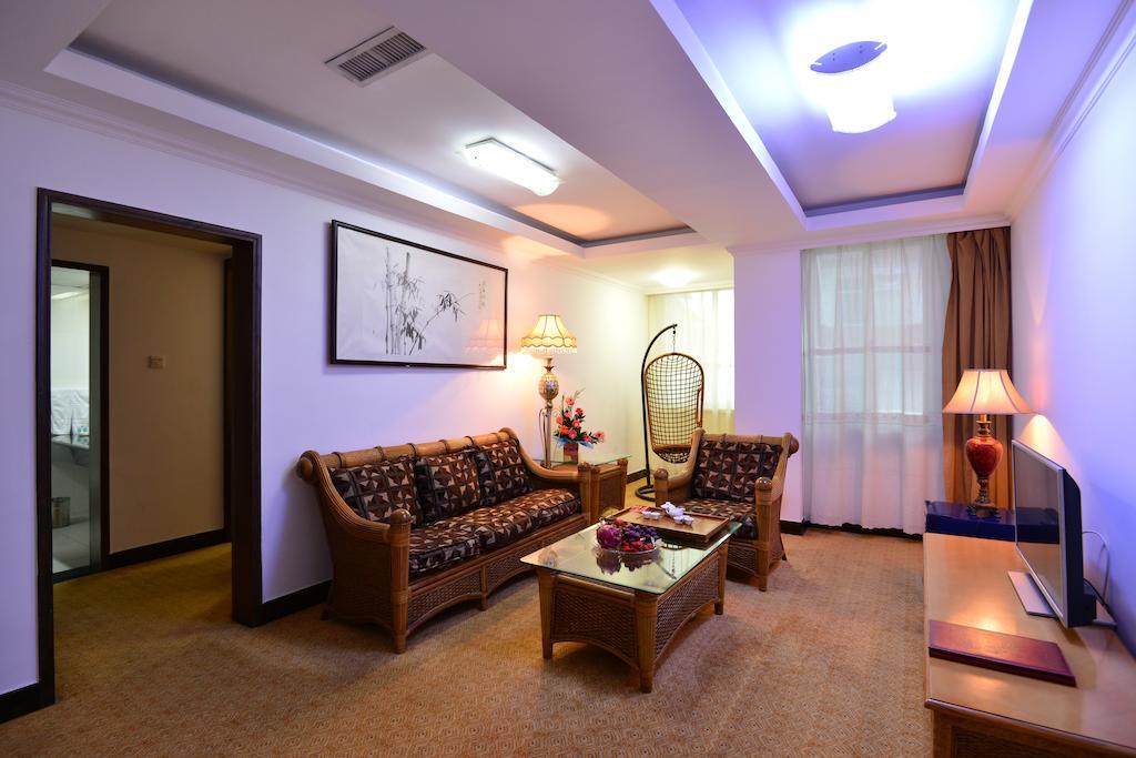 Baodao Exhibition Center Hotel Уйишань Номер фото