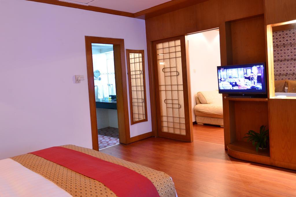 Baodao Exhibition Center Hotel Уйишань Номер фото