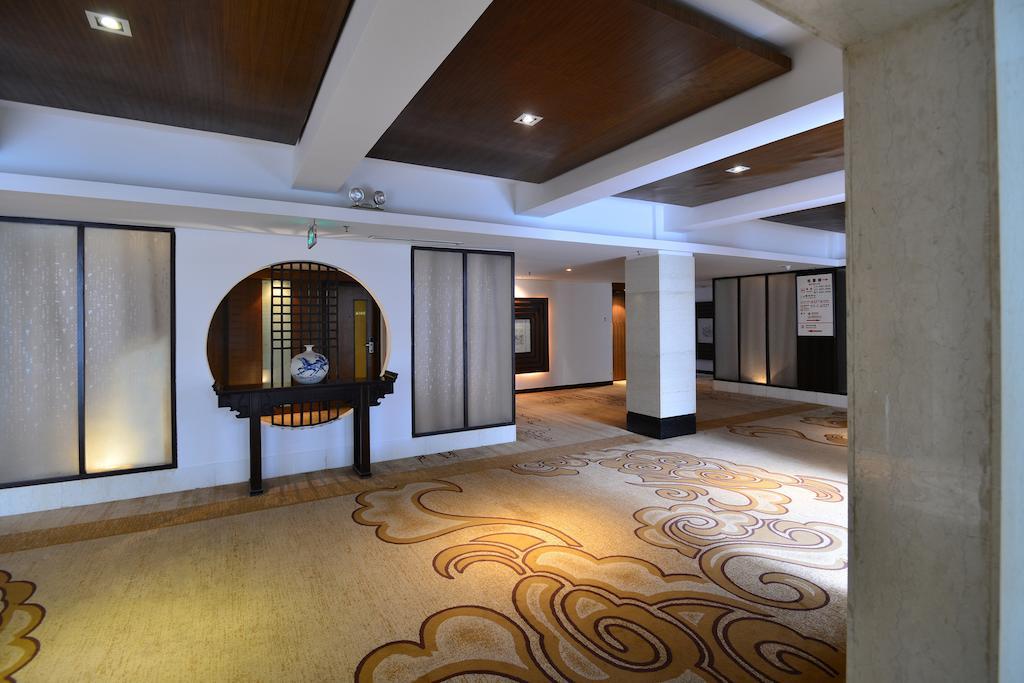 Baodao Exhibition Center Hotel Уйишань Экстерьер фото