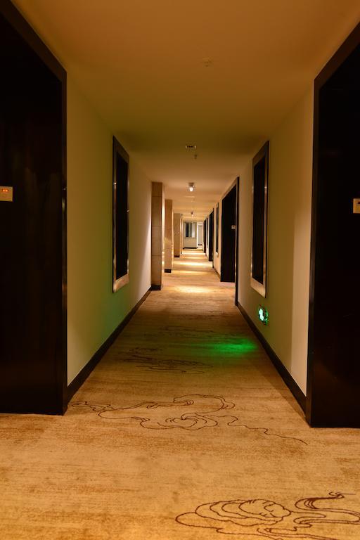 Baodao Exhibition Center Hotel Уйишань Экстерьер фото