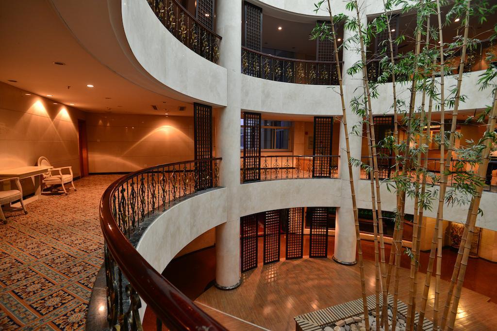 Baodao Exhibition Center Hotel Уйишань Экстерьер фото