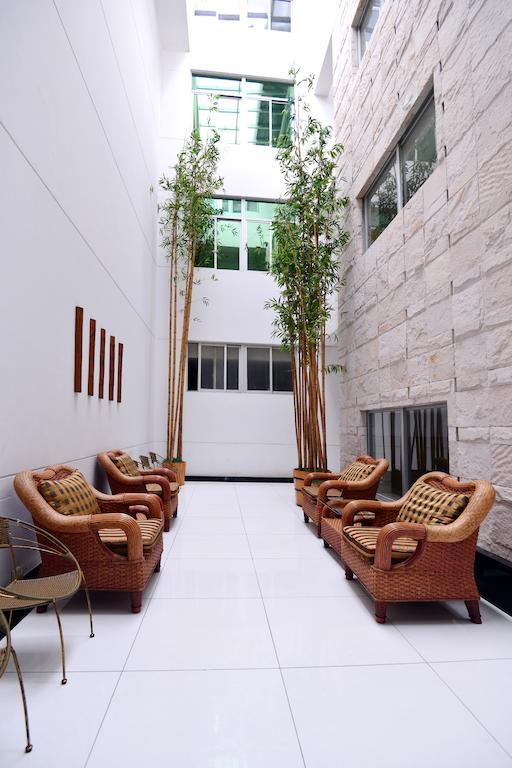 Baodao Exhibition Center Hotel Уйишань Экстерьер фото