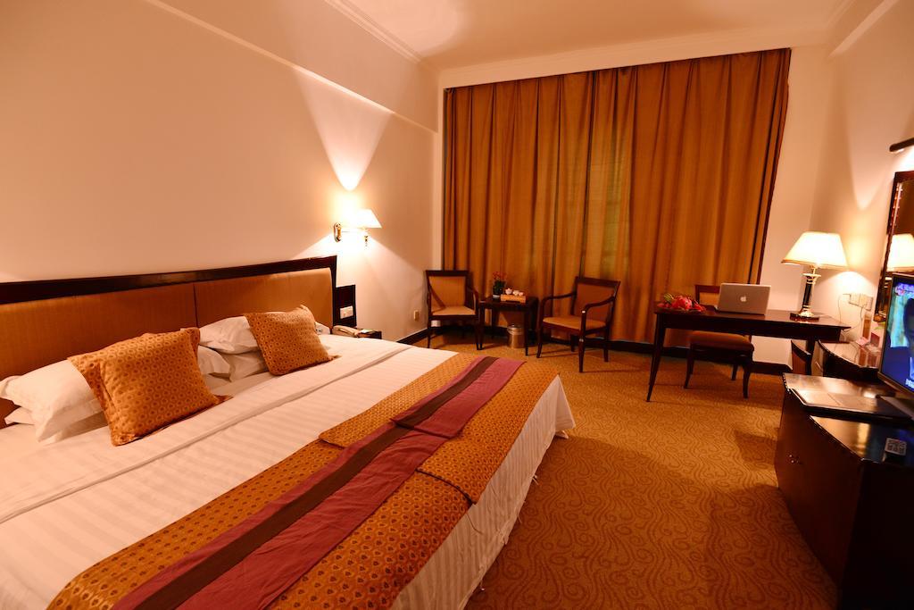 Baodao Exhibition Center Hotel Уйишань Номер фото