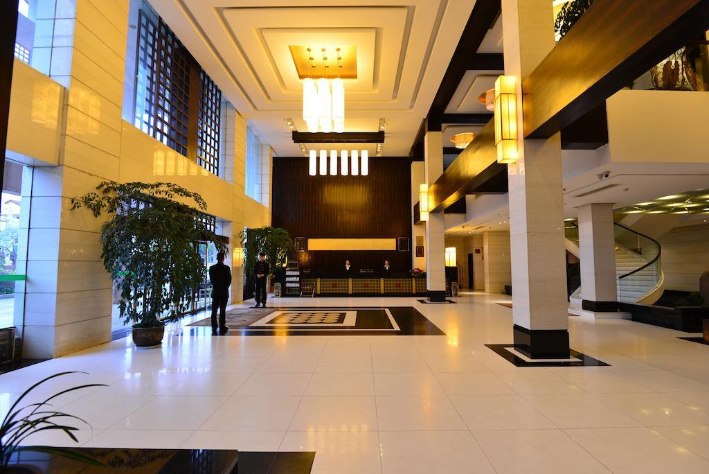 Baodao Exhibition Center Hotel Уйишань Экстерьер фото