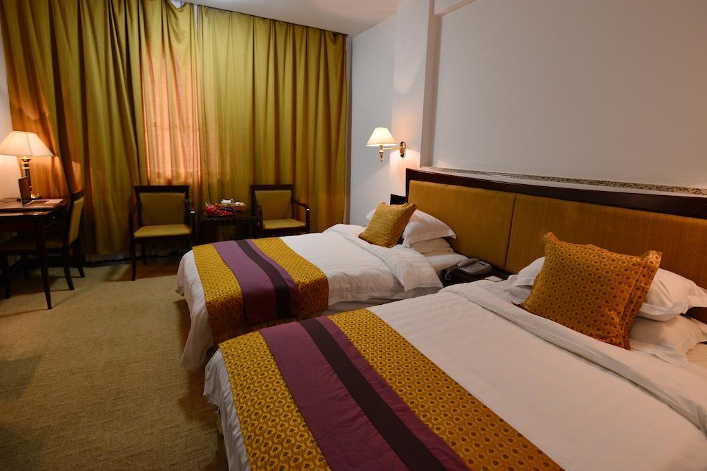 Baodao Exhibition Center Hotel Уйишань Номер фото