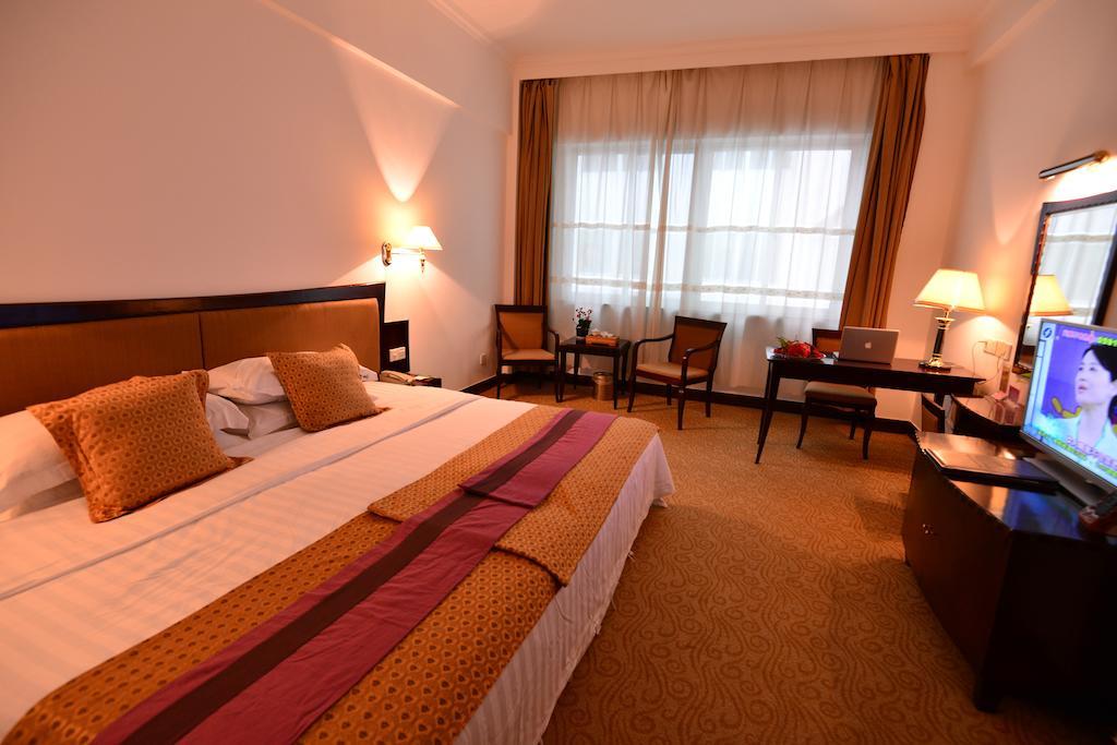 Baodao Exhibition Center Hotel Уйишань Номер фото