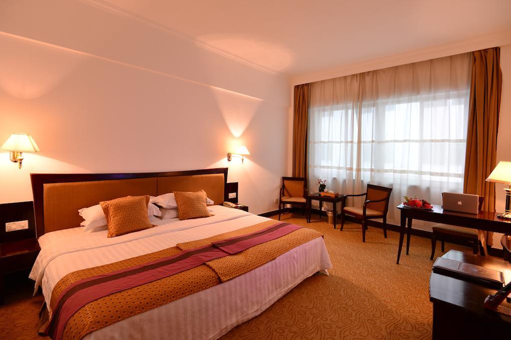 Baodao Exhibition Center Hotel Уйишань Экстерьер фото