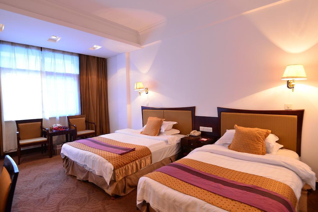 Baodao Exhibition Center Hotel Уйишань Экстерьер фото