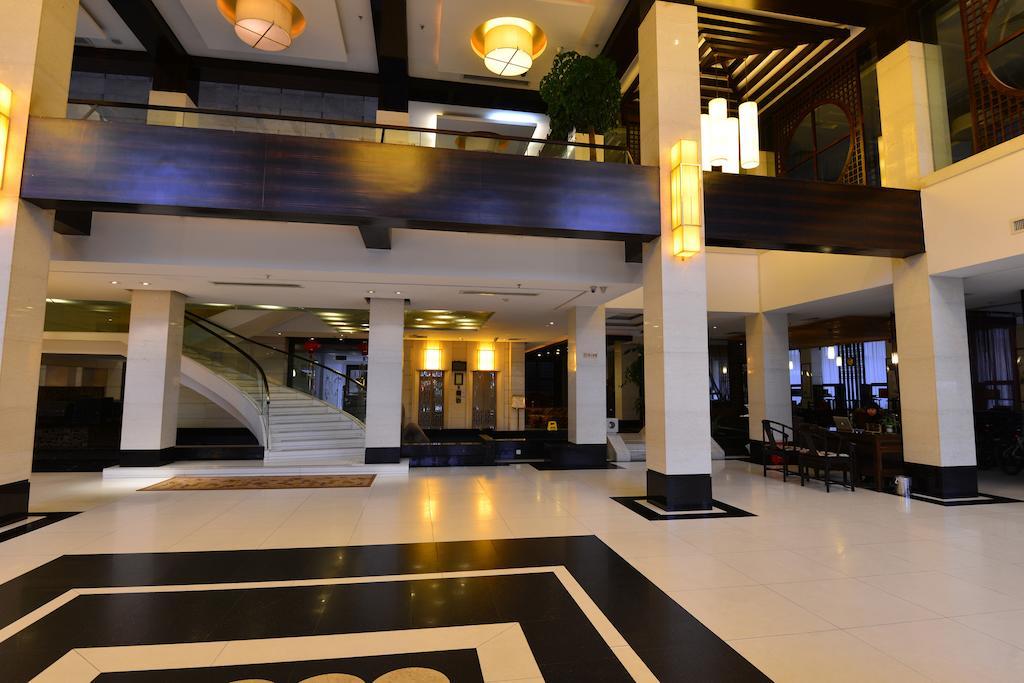 Baodao Exhibition Center Hotel Уйишань Экстерьер фото