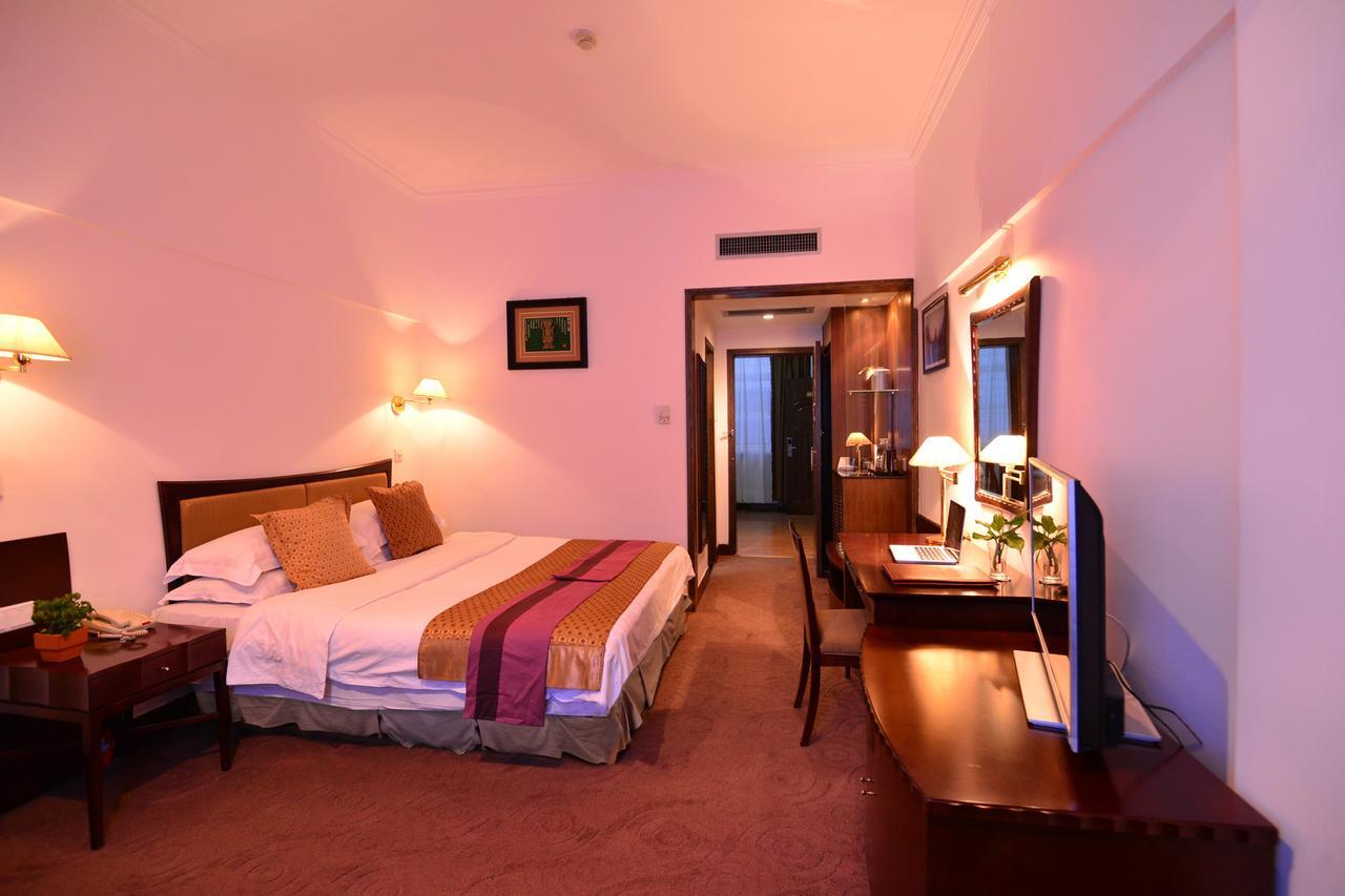 Baodao Exhibition Center Hotel Уйишань Экстерьер фото