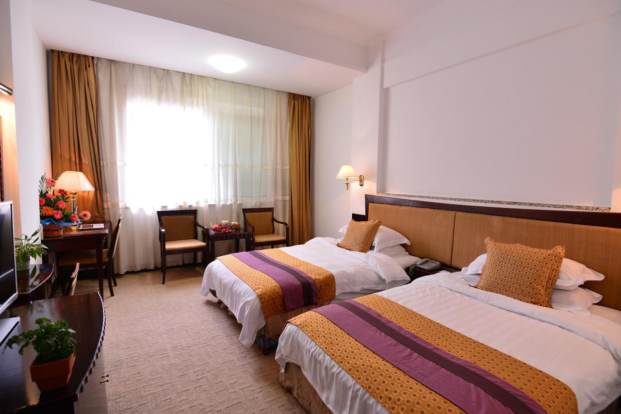 Baodao Exhibition Center Hotel Уйишань Экстерьер фото