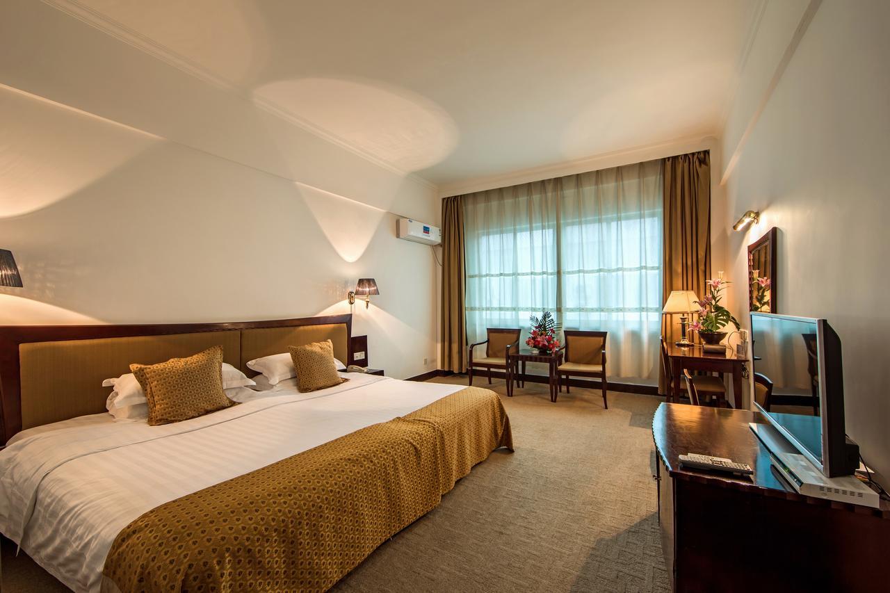 Baodao Exhibition Center Hotel Уйишань Экстерьер фото